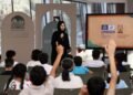 Children engaging in creative writing and storytelling at the Sharjah Public Libraries Summer Camp 2026.