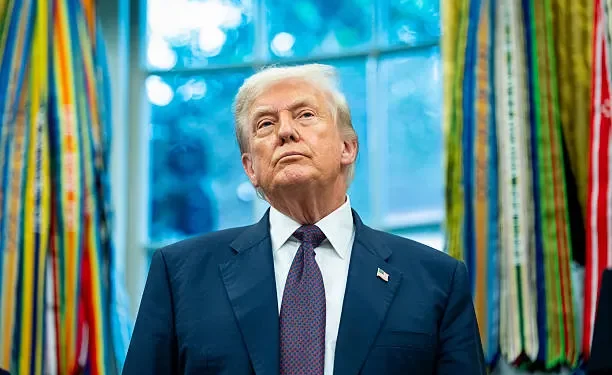 Donald Trump speaking at a press conference addressing Middle East security policy