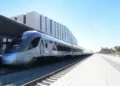Etihad Rail passenger train traveling on the track in the UAE
