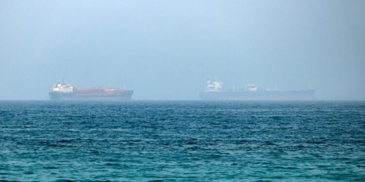 An oil tanker has been disabled off Ash Shishah, Oman, after an unidentified projectile hit its engine room. Crew reported safe as security alerts widen near Strait of Hormuz.