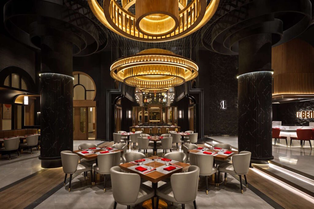Chef performing live teppanyaki cooking at Benihana Ibn Battuta restaurant Dubai