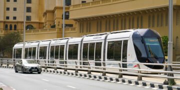 Passengers boarding a Dubai Metro train at BurJuman interchange station in Dubai.
