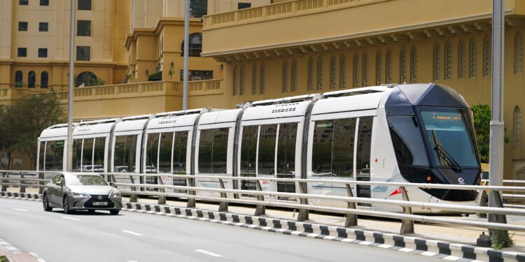 Passengers boarding a Dubai Metro train at BurJuman interchange station in Dubai.