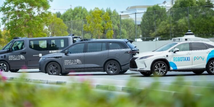 Baidu Apollo Go autonomous Robotaxi driving on a street in Dubai, UAE