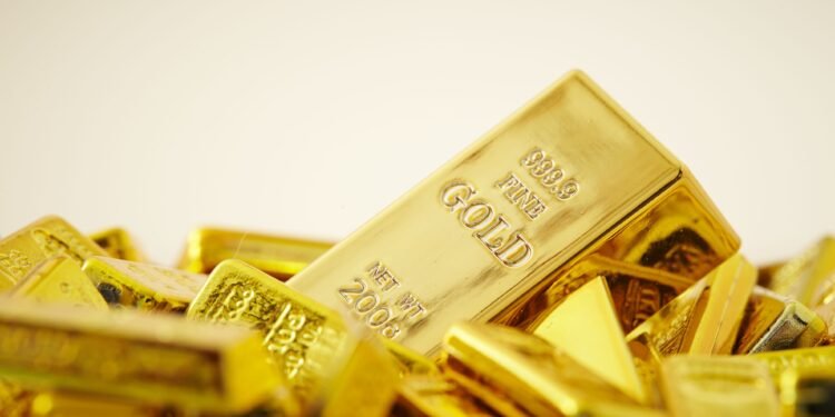 Gold prices fell to a two-week low of $4,417.04 per ounce on Monday following hawkish signals from Fed Chair Kevin Warsh regarding U.S. interest rates.