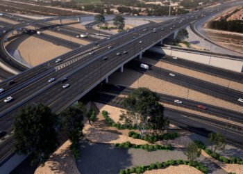 Aerial view of the newly opened four-lane RTA bridge at Al Qudra Road intersection in Dubai.