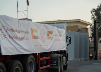 UAE humanitarian aid trucks prepared for Gaza at Al Arish logistics center.