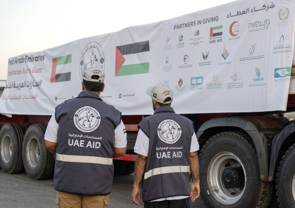 UAE humanitarian aid trucks prepared for Gaza at Al Arish logistics center.