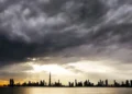 Dark rain clouds over the UAE highway during rain warning