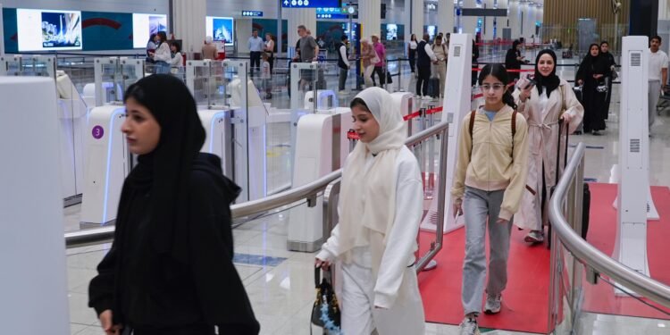 Over 745,000 passengers cleared DXB immigration via Dubai's contactless 'Red Carpet' corridor in 2026, slashing border clearance times to 3.4 seconds.